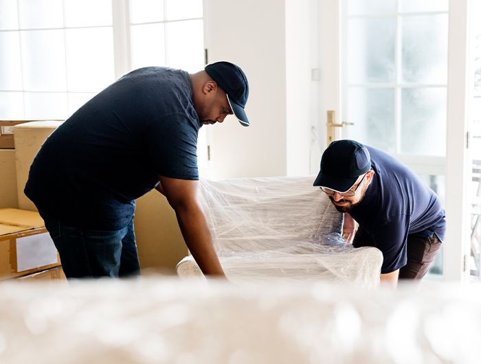 moving service packing chair in a house